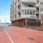 Spacious Two Bedroom Apartment With Terrace Right On The Surf Beach