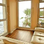 Flatguest - Seaside Beauty
